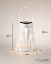 Weißes Solar-Windlicht mit 125 × 125 × 160 mm Körpermaß und 26 cm Gesamthöhe mit Henkel